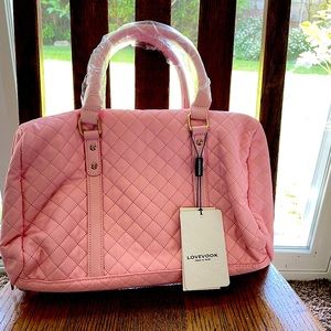Brand new, never used Lovevook toiletry bag.